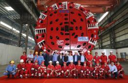 Engineers with Double Shield Tunnel Boring Machine